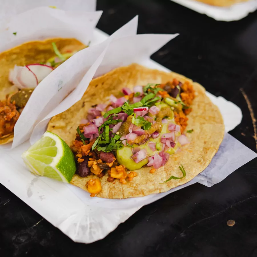Freshly served tacos on a restaurant table